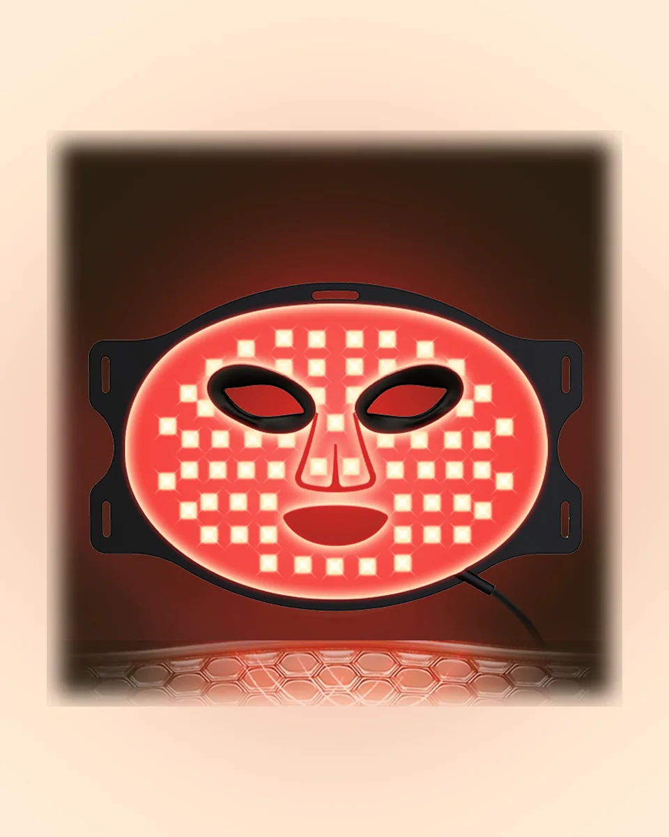 The LED face mask glowing red